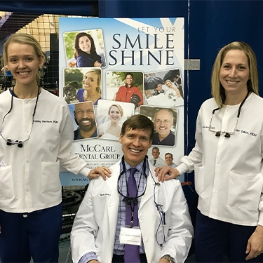 Millersville dentist Doctor Clayton McCarl and dental team members Kim and Ashley at BWMC Heartbeat for Health event
