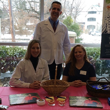 Millersville dentist Doctor Jay McCArl and dental team members Kim and Tracy at BWMC Heartbeat for Health event