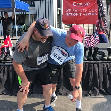 Doctor Jay McCarl and Bill Contarino tired after Travis Manion Foundation 5 K run