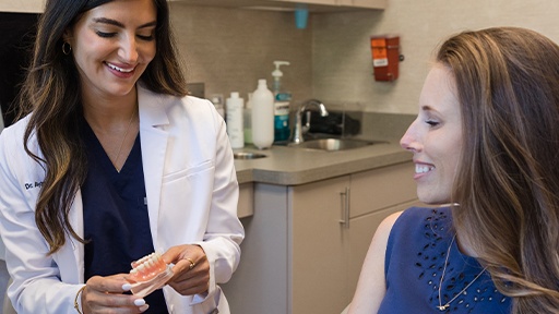 Dr. Jay McCarl smiling at dental patient