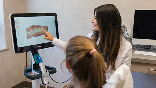 Dr. David McCarl smiling at dental patient