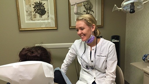 Woman smiling at dental patient